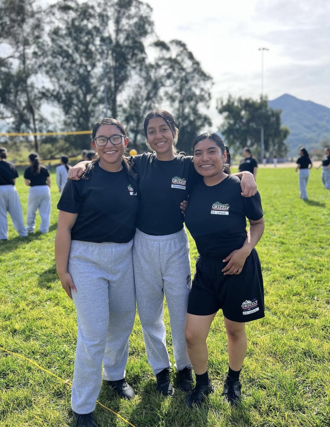 Three female students smiling